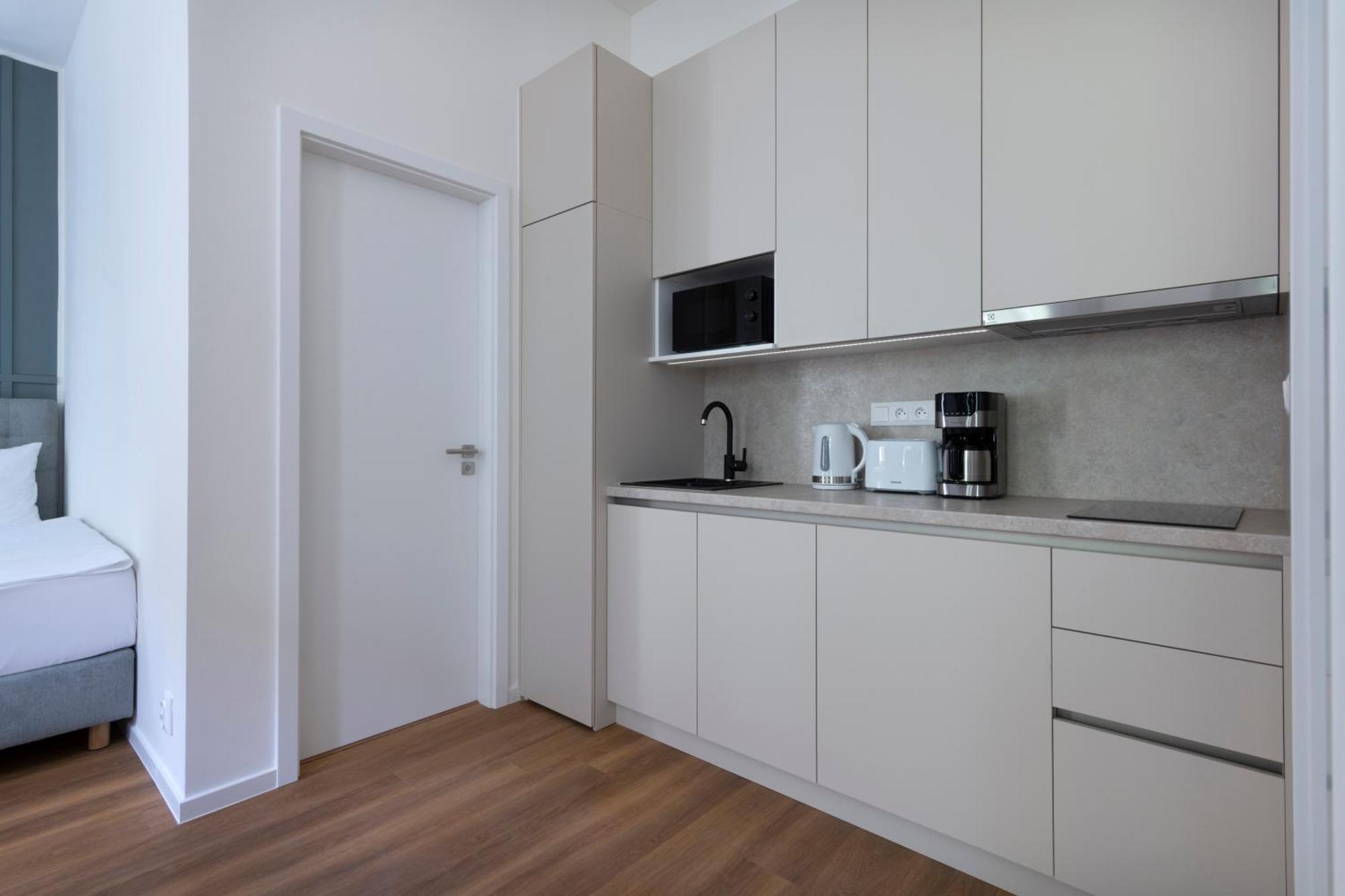 Encore Boutique Residence By Dwellfort Prag Zimmer foto