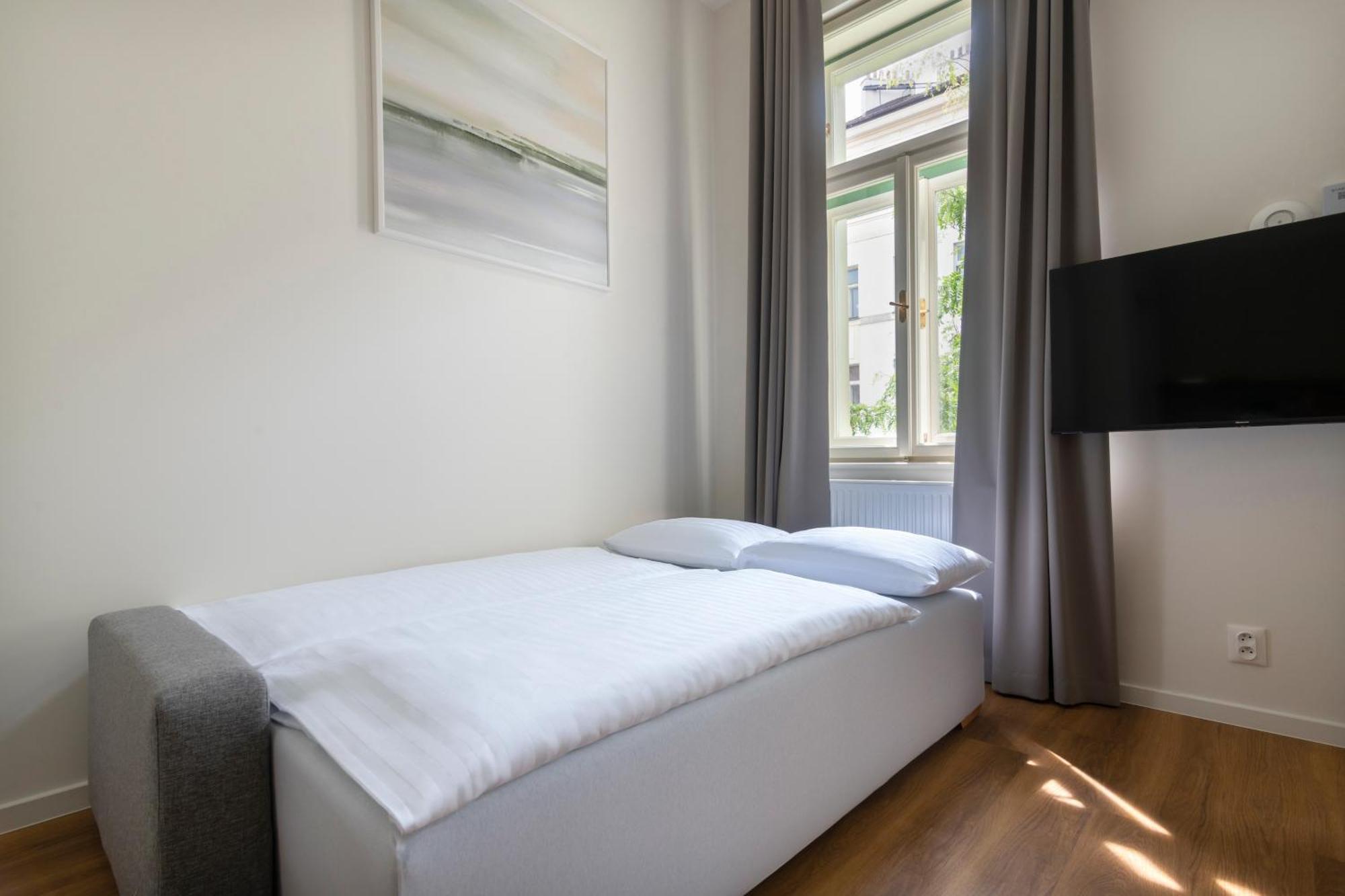 Encore Boutique Residence By Dwellfort Prag Zimmer foto